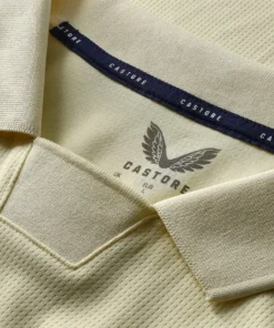 Close-up of the polo-style collar on the Everton Away Kit 25/26 by Castore in pastel yellow.