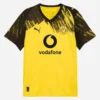 PUMA Borussia Dortmund Home Kit 25/26, yellow with black details, V-neck, short sleeves, front view.