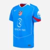 Nike Atletico Madrid Third Kit 25/26, front view, blue base, red accents, white highlights, faux-polo collar, short sleeves.