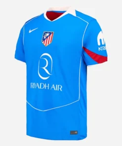 Nike Atletico Madrid Third Kit 25/26, front view, blue base, red accents, white highlights, faux-polo collar, short sleeves.