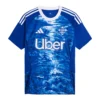 Adidas Como Home Kit 25/26 in royal blue, crewneck, short sleeves, front view with club crest and design details.