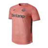 Front view of the NB FC Porto 25/26 Away Kit in sunfade pink with crewneck and short sleeves.