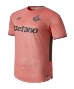 Front view of the NB FC Porto 25/26 Away Kit in sunfade pink with crewneck and short sleeves.