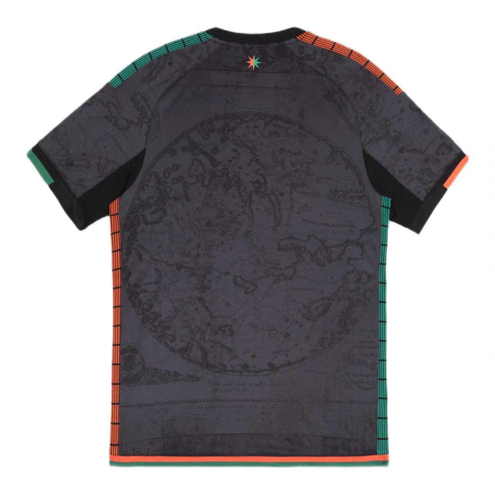 Venezia Home Kit 25/26 in black with orange and green details, short sleeves, back view, no number.