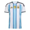 Adidas Argentina Home Kit 2026, white and sky blue stripes, short sleeves, front view.