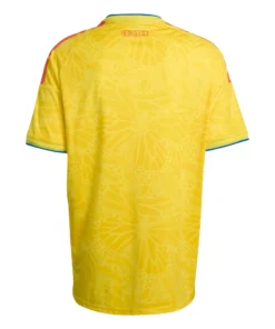 Back view of adidas Colombia Home Kit 2026, yellow with subtle butterfly-wing motifs, short sleeves, no name or number.