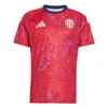 Adidas Costa Rica Home Jersey 2026, front view, red with navy and white accents, crewneck, short sleeves.