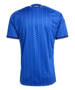 Back view of adidas Italy Home Kit 2026, blue, short sleeves, ‘AZZURRA’ in gold on back neck, no name or number.