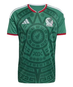 Adidas Mexico Home Jersey 2026, front view, green with Aztec-inspired motifs, EQT collar, short sleeves.