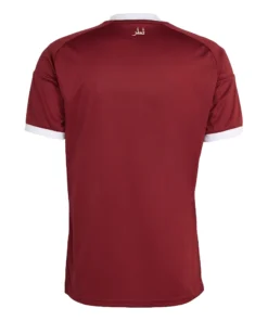 Back view of adidas Qatar Home Kit 2026, maroon base, short sleeves, no name or number.