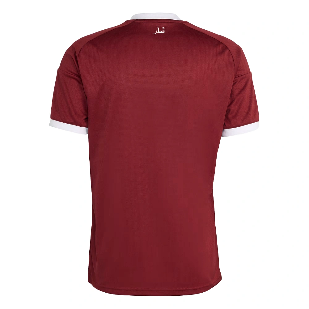 Back view of adidas Qatar Home Kit 2026, maroon base, short sleeves, no name or number.