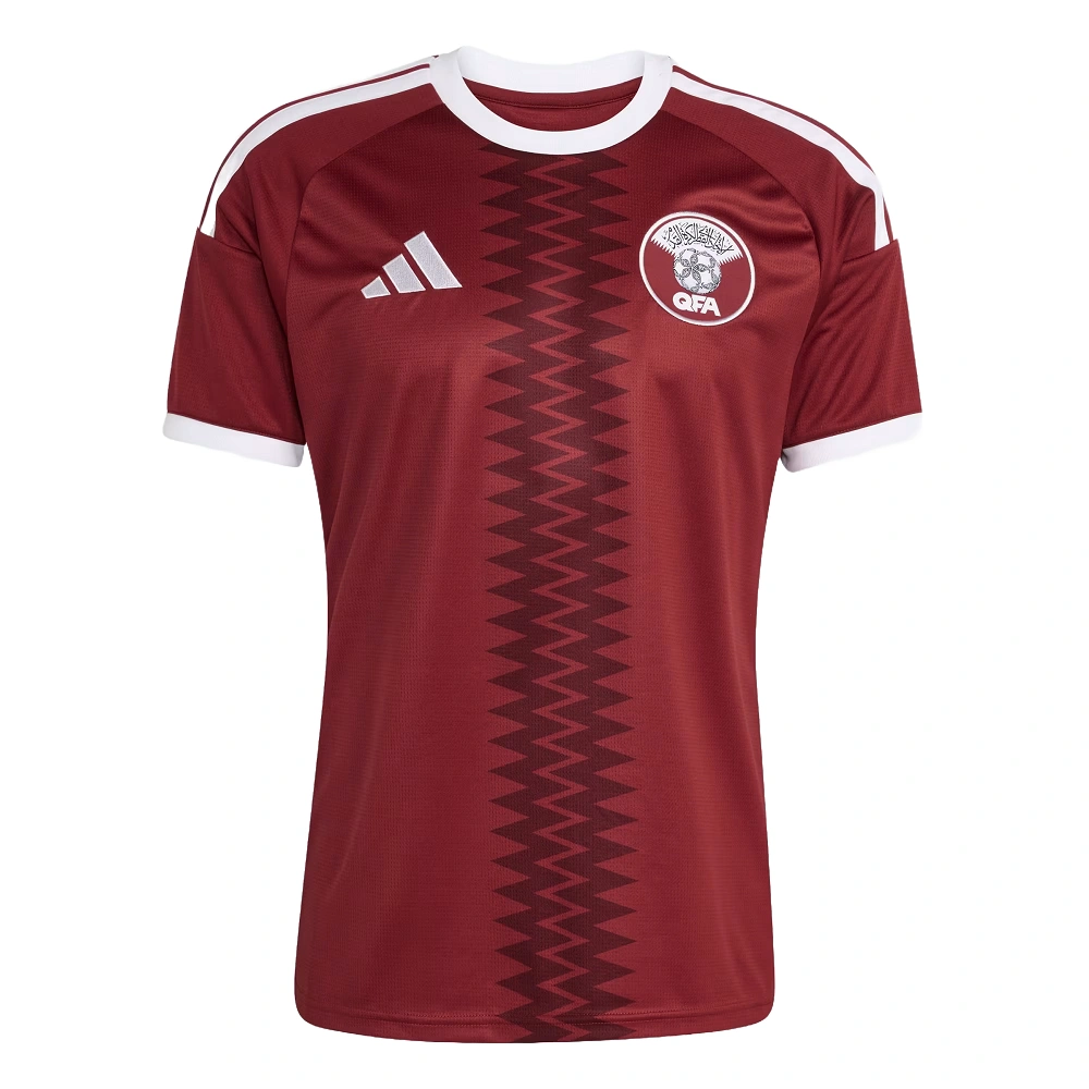 Adidas Qatar Home Kit 2026, front view, maroon base with white details, crewneck, short sleeves.