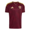 Adidas Venezuela Home Jersey 2026, front view, burgundy base, V-neck collar, short sleeves.