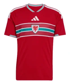 Adidas Wales Home Kit 2026, front view, red base with green and white accents, short sleeves.