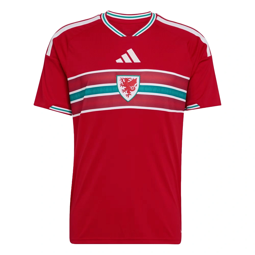 Adidas Wales Home Kit 2026, front view, red base with green and white accents, short sleeves.