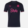Everton Fourth Kit 25/26 by Castore, front view in dark blue with pink accents and abstract skyline graphic.