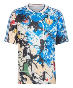 Manchester United Stone Roses Kit 2026 front view, all-over band artwork print with lemon motif, adidas Trefoil logo.