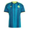 Front view of Colombia Away Jersey 2026. Blue kit with turquoise wave pattern, lucid lemon accents, and crossover neck.