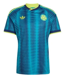 Front view of Colombia Away Jersey 2026. Blue kit with turquoise wave pattern, lucid lemon accents, and crossover neck.