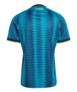 Back view of Colombia Away Jersey 2026. Blue kit with turquoise wave pattern, and clean back without name or number.