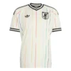 Front view of Japan Away Kit 2026. Off-white kit with rain-inspired vertical lines, bold red center stripe, and striped V-neck.