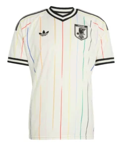 Front view of Japan Away Kit 2026. Off-white kit with rain-inspired vertical lines, bold red center stripe, and striped V-neck.