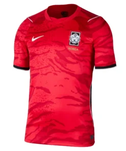 Nike South Korea Home Kit 2026, front view, red design, national crest, black sleeve cuffs, V-notch collar, short sleeves