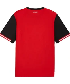 Back view of PUMA Austria Home Kit 2026, bright red with Immer wieder Österreich slogan, blank back.