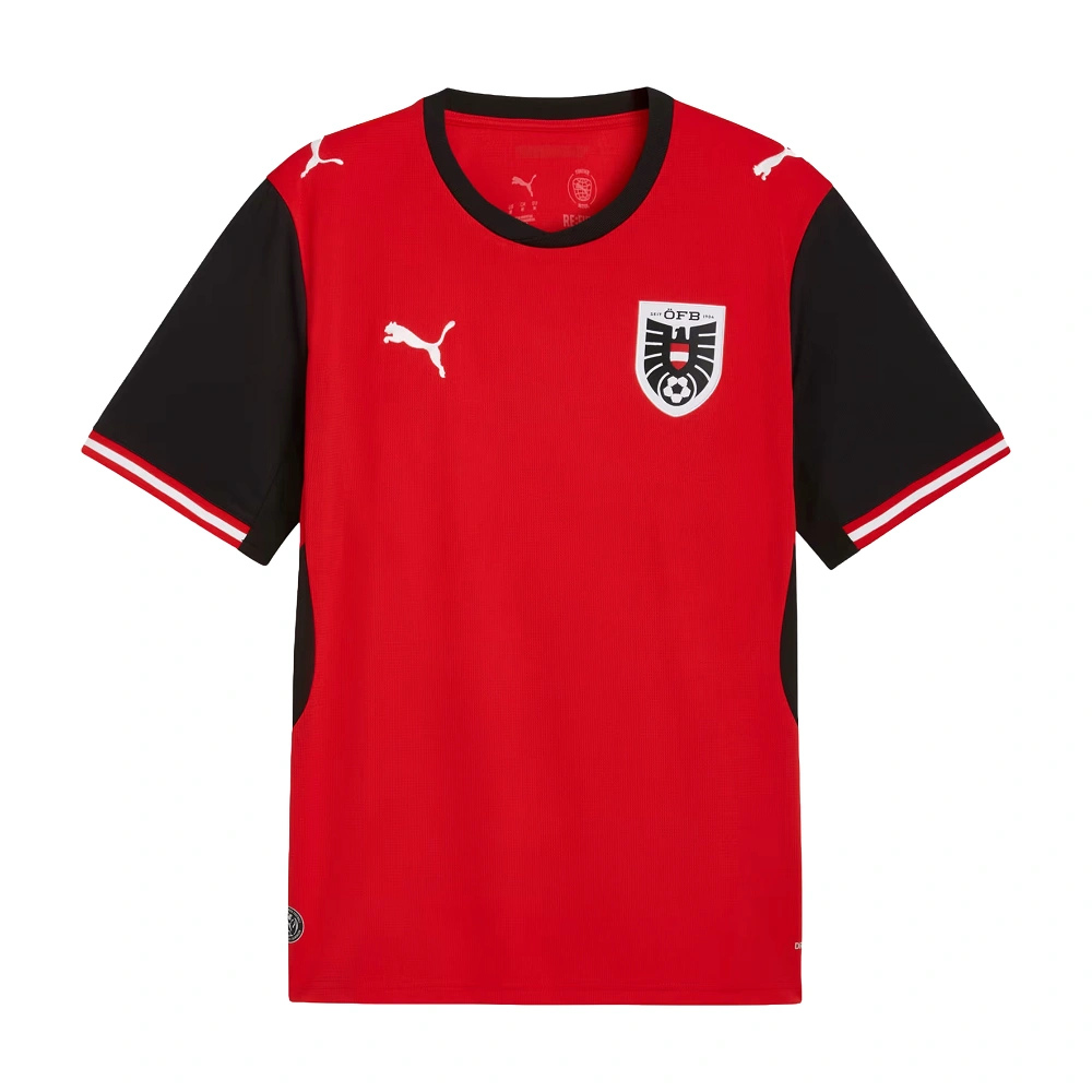 Front view of Austria Home Kit 2026 by PUMA, vibrant bright red, black crewneck, short sleeves.