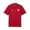 Front view of Czechia Home Kit 2026 by PUMA, deep red base, silver detailing, navy accents, short sleeves.