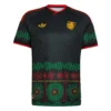 Front of the black adidas Jamaica Away Jersey 2026 showing red, gold, and green soundwaves and Trefoil logo.