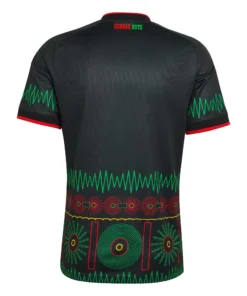 Back of the black Jamaica Away Jersey 2026 showing green soundwave patterns, vinyl graphics, and Reggae Boyz text.