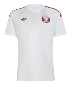 Qatar Away Kit 2026, front view, crisp white design with striking burgundy accents and V-neck.