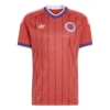 Adidas Scotland Away Kit 2026, front view, scarlet red base with purple pinstripes, short sleeves.