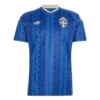 Front view of adidas Sweden Away Kit 2026, royal blue base with geometric patterns, Trefoil logo, and short sleeves.