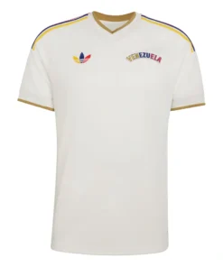Front view, Venezuela Away Jersey 2026 by adidas, off-white base, V-neck collar, short sleeves, retro wordmark crest.