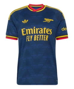 Front view of the adidas Arsenal 26/27 Away Kit with navy blue base, geometric graphics, and the iconic cannon crest.