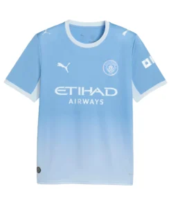 Front view of the Puma Manchester City Home Kit 26/27 in sky blue gradient with metallic chest crest and sponsor. 