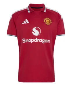adidas Manchester United Home Kit 26/27, front view, red design with polo collar, adidas logo, and iconic crest.